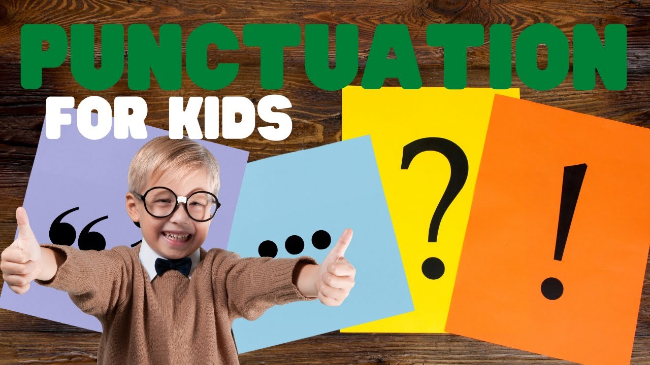 Multi-cultural elementary school children holding up large, colorful punctuation mark signs while smiling.